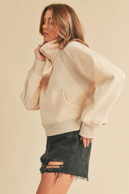 AEMI + CO Dove Funnel Neck Half Zip
